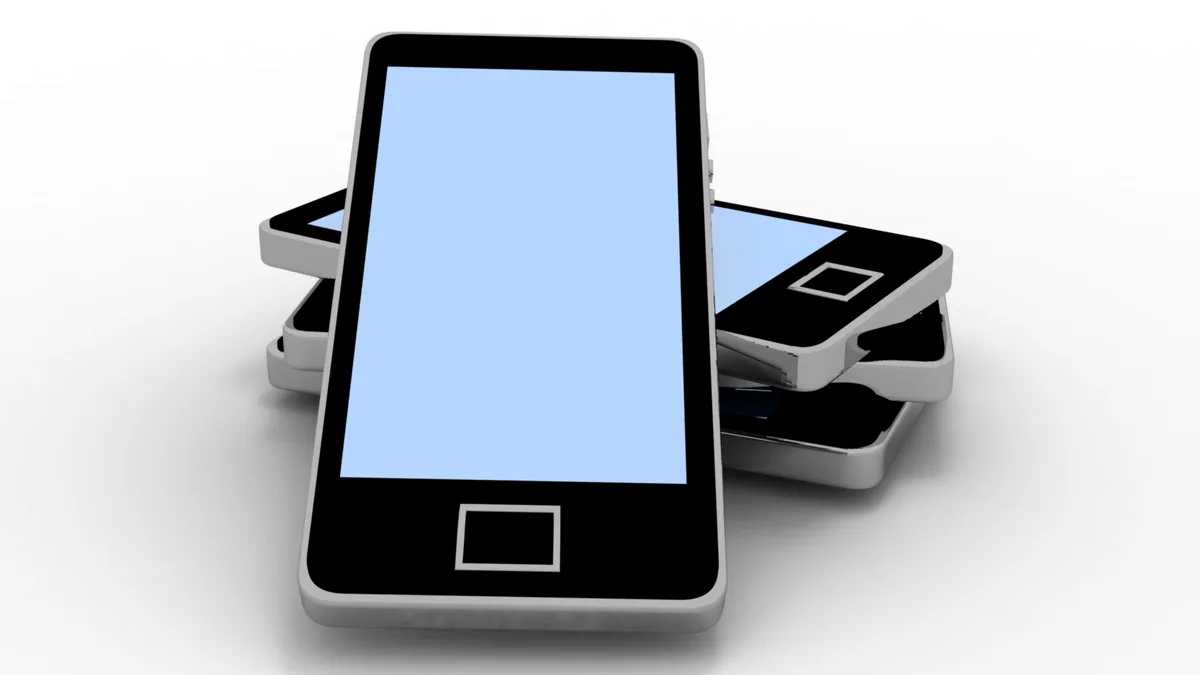 A smartphone running a Linux terminal emulator on its screen.